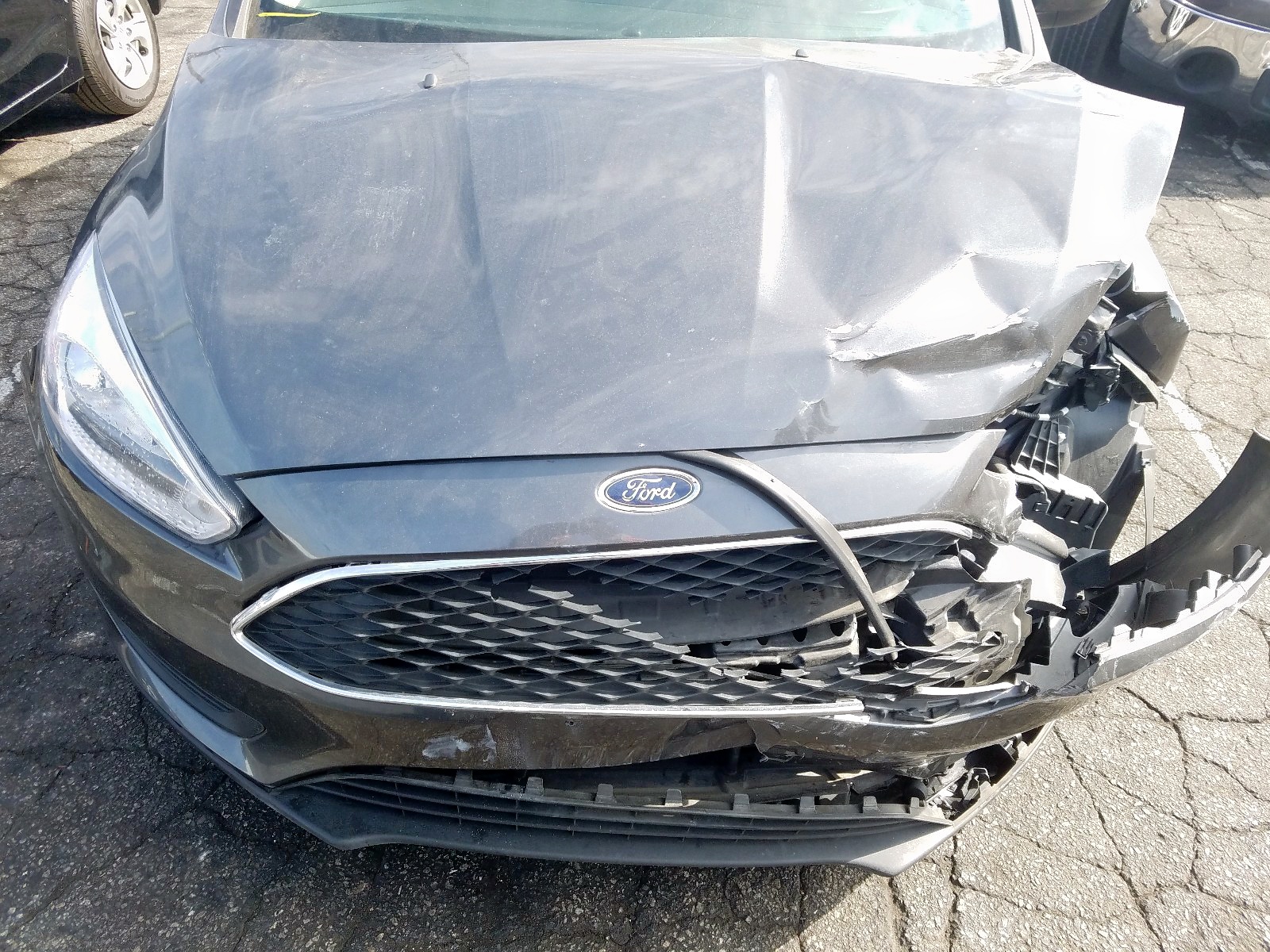 2018 Ford Focus VIN 1FADP3F29JL252665 photo 7
