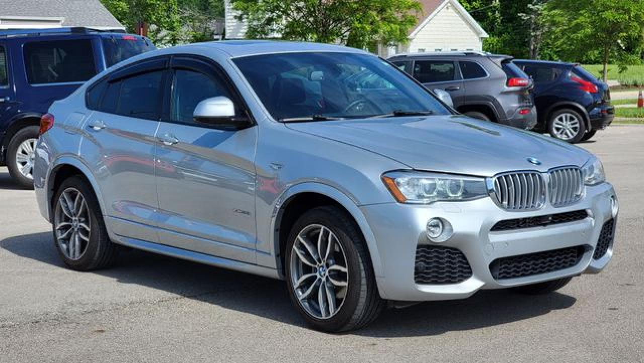 2016 BMW X4 VIN 5UXXW5C58G0N92189 photo 1