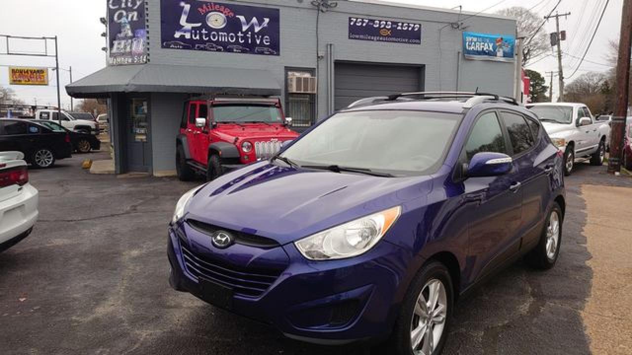 2012 Hyundai Tucson VIN KM8JU3AC5CU391626 photo 1