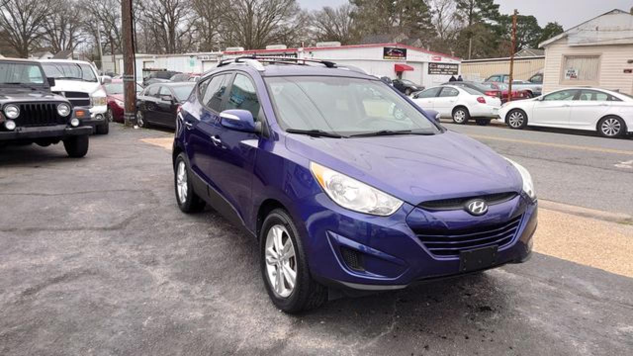 2012 Hyundai Tucson VIN KM8JU3AC5CU391626 photo 4
