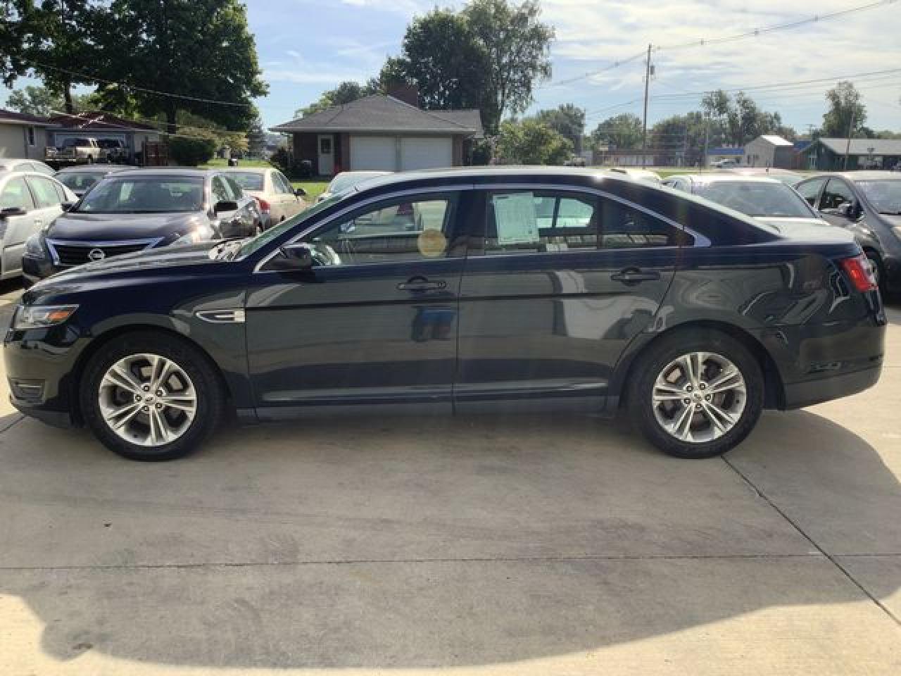 2014 Ford Taurus VIN 1FAHP2E86EG133729 photo 4