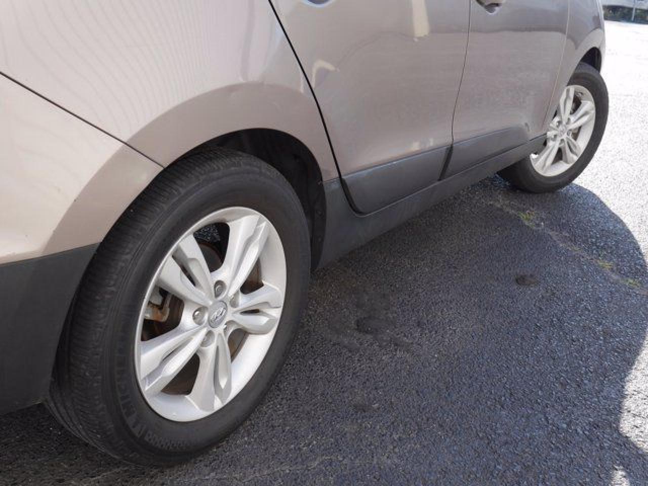 2012 Hyundai Tucson VIN KM8JU3AC5CU422583 photo 10