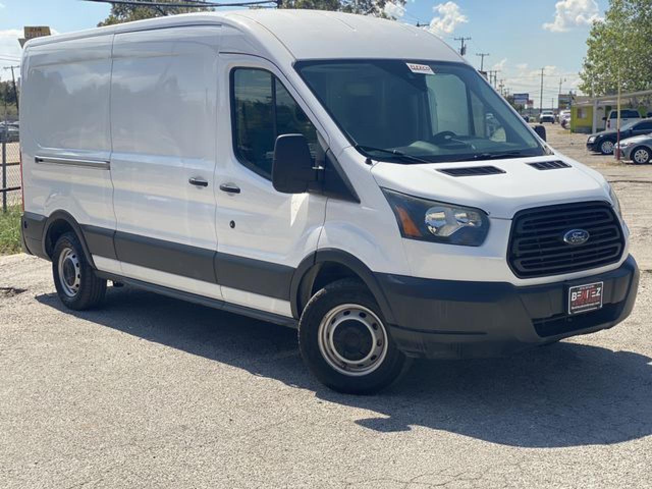 2015 Ford Transit VIN 1FTNE2CM8FKB31398 photo 2