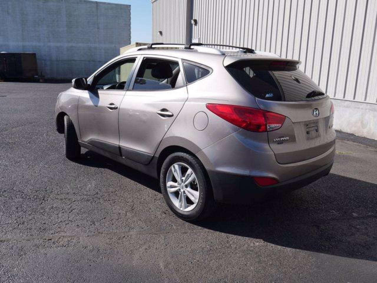 2012 Hyundai Tucson VIN KM8JU3AC5CU422583 photo 7