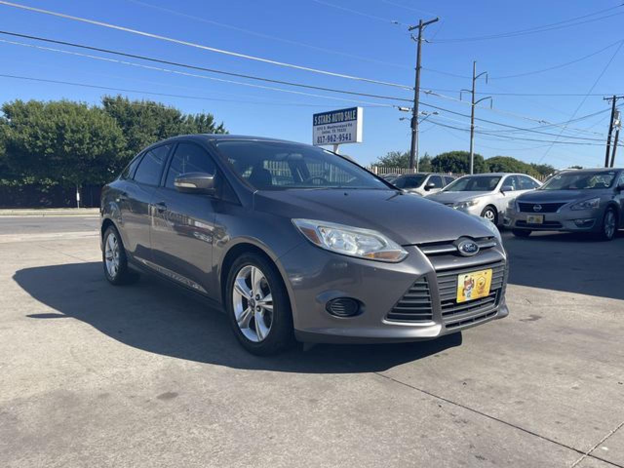 2013 Ford Focus VIN 1FADP3F20DL162924 photo 1