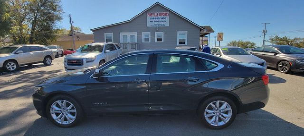2018 Chevrolet Impala VIN 2G1105S32J9138843 photo 1