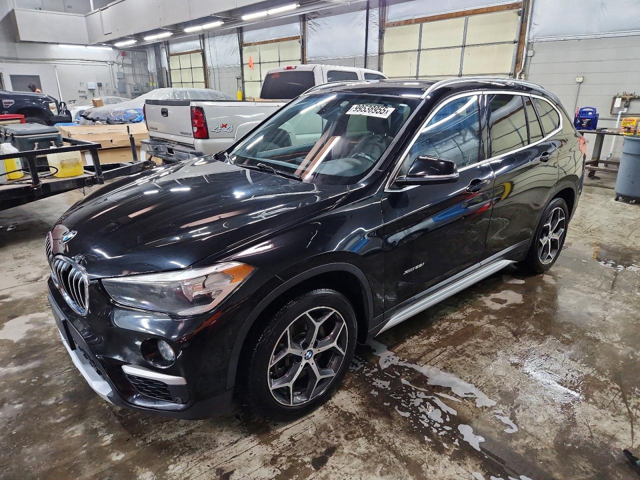 2018 BMW X1 VIN WBXHT3C31J5F92200 photo 1