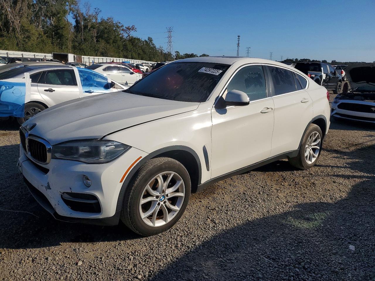 2016 BMW X6 VIN 5UXKU0C50G0F92144 photo 1