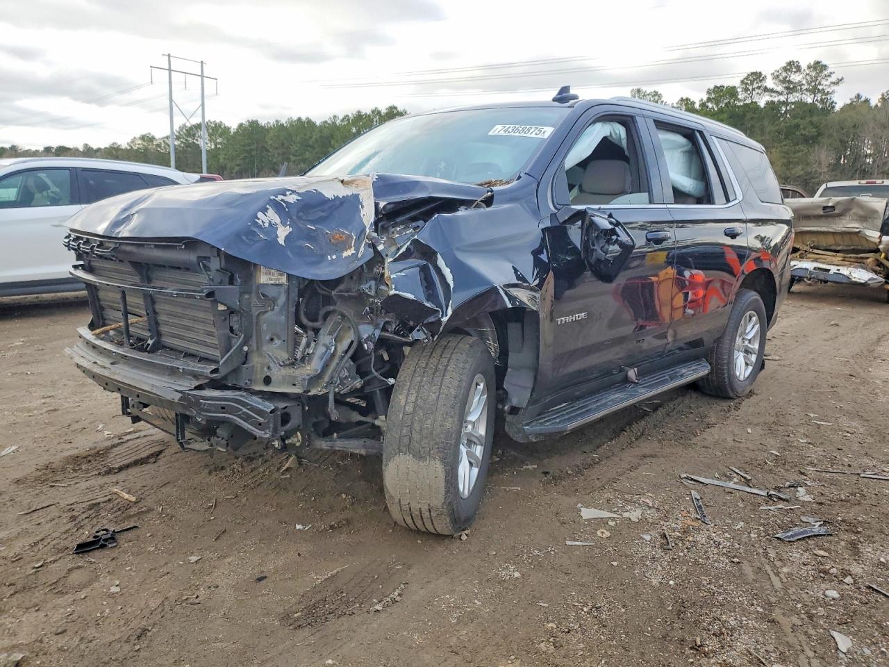2022 Chevrolet Tahoe VIN 1GNSCMKD1NR121007 photo 1