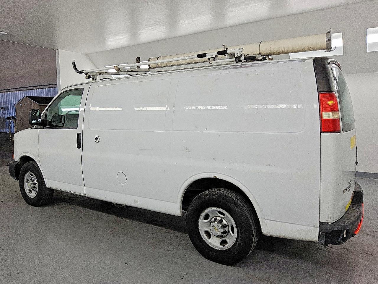 2013 CHEV Express VIN 1GCWGFCB5D1902245 photo 2