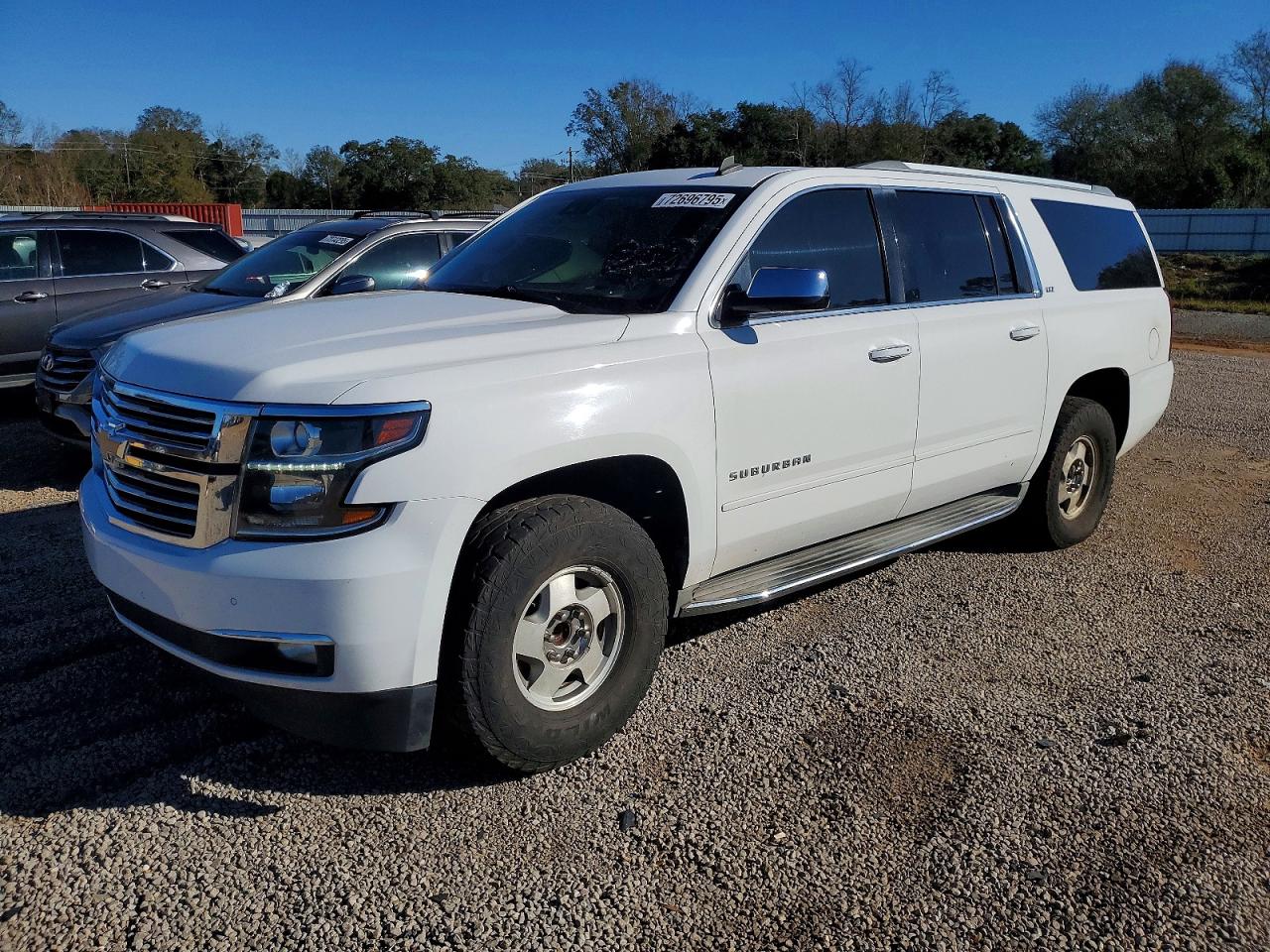 2015 Chevrolet Suburban VIN 1GNSCKKC7FR274701 photo 1