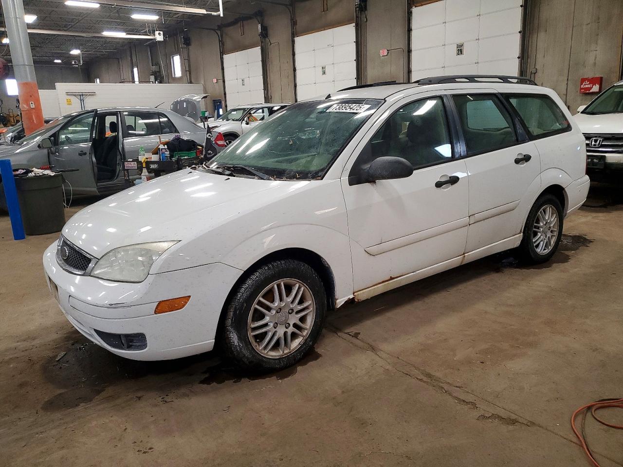 2006 Ford Focus VIN 1FAFP36N76W108119 photo 1