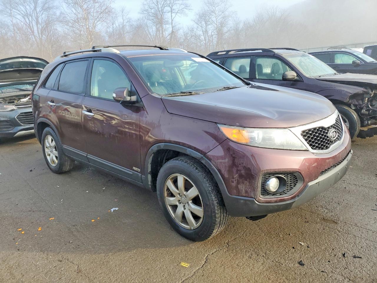 2012 Kia Sorento VIN 5XYKTDA61CG299104 photo 4