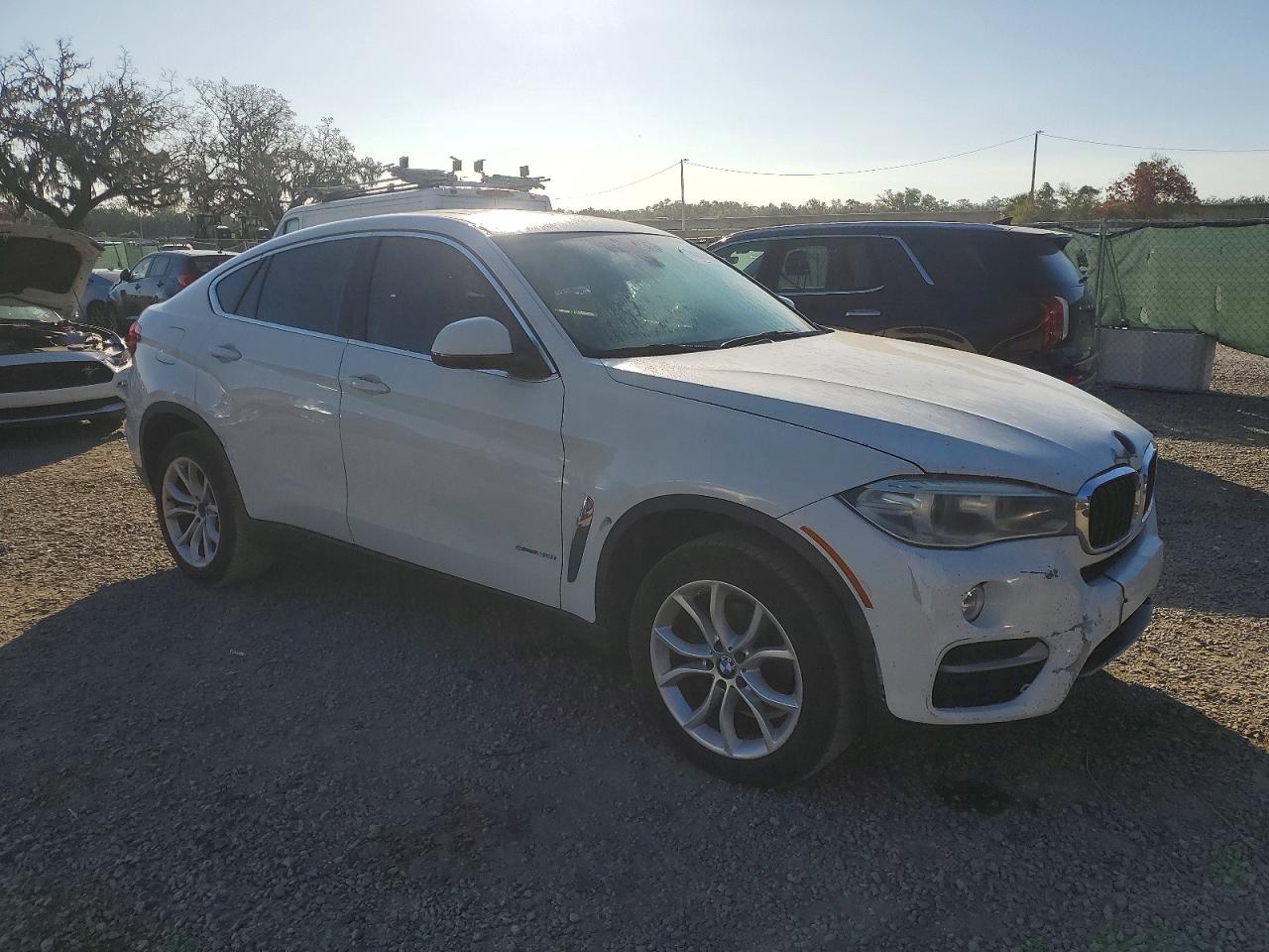 2016 BMW X6 VIN 5UXKU0C50G0F92144 photo 4