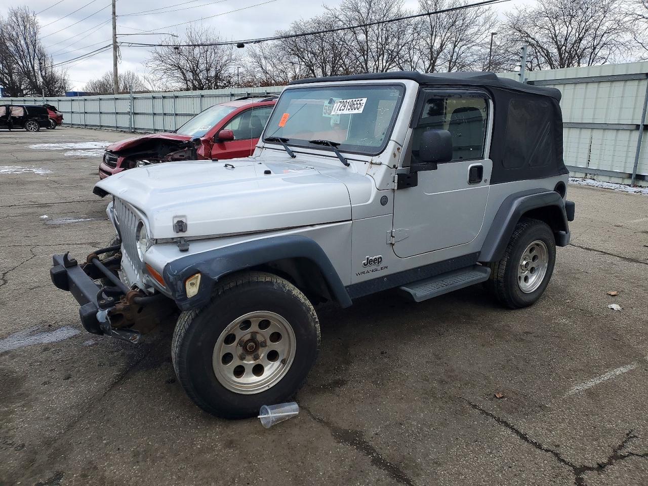 2004 Jeep Wrangler / VIN 1J4FA39S54P792280 photo 1