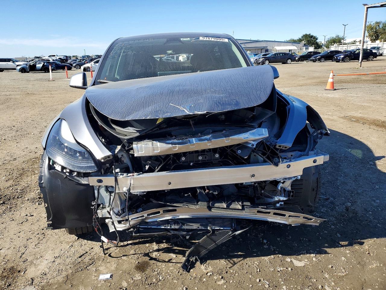2025 Tesla Model y VIN 7SAYGDED8SF314150 photo 5