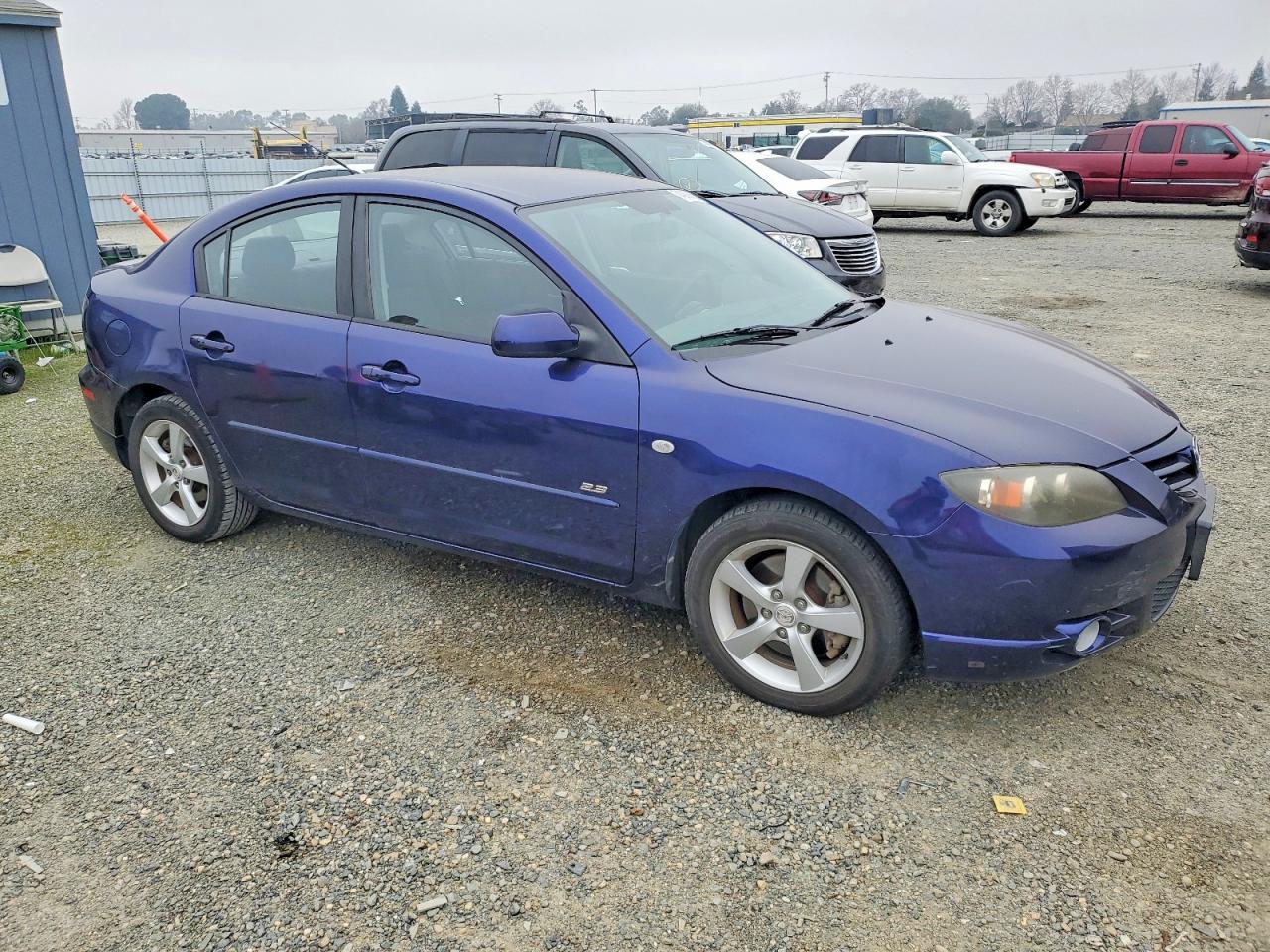 2005 Mazda Mazda3 VIN JM1BK323X51293225 photo 4