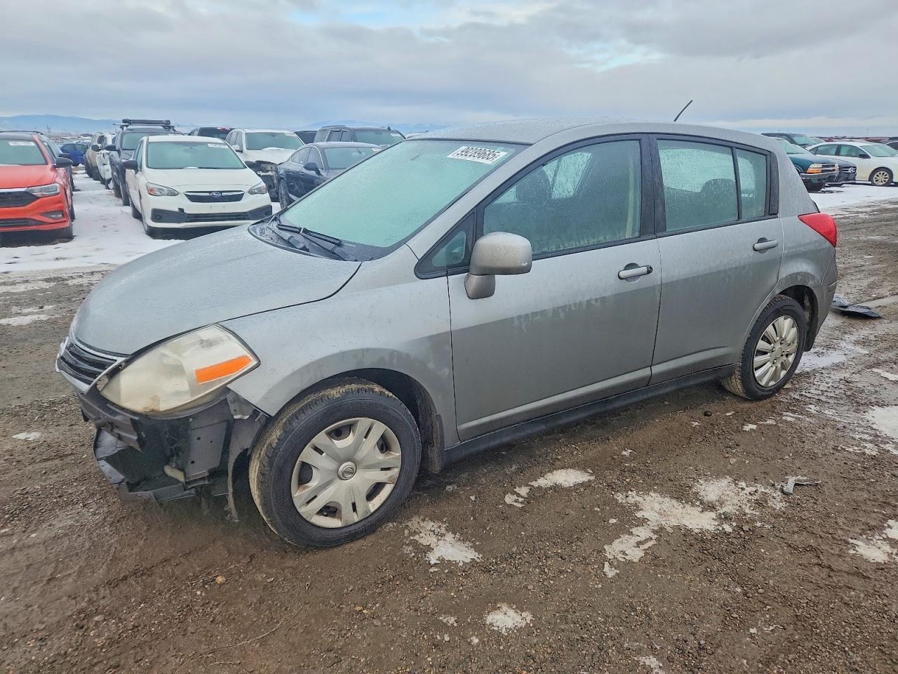 2010 NISS Versa VIN 3N1BC1CP9AL365041 photo 1
