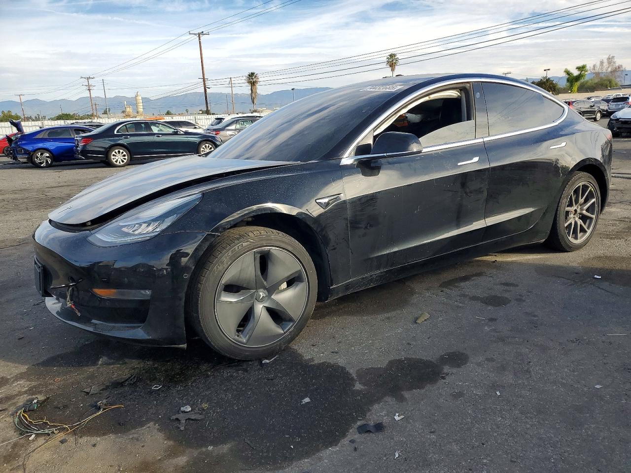 2019 Tesla Model 3 VIN 5YJ3E1EA7KF399063 photo 1