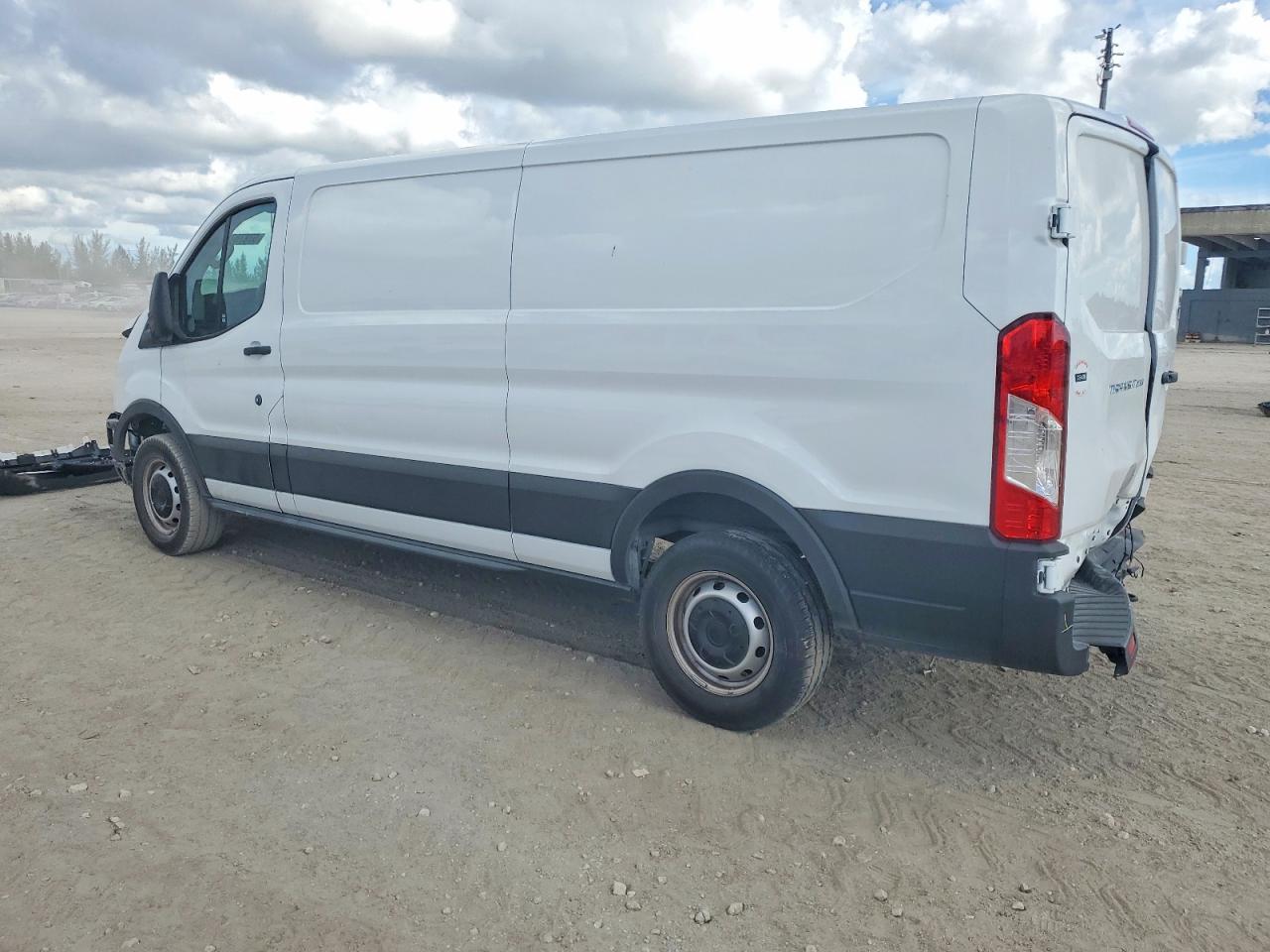 2025 Ford Transit VIN 1FTBR1Y89SKA07406 photo 2