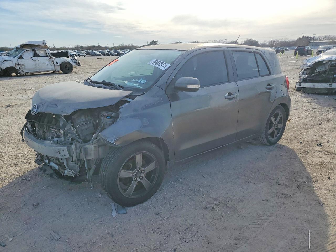 2012 Scion Xd release VIN JTKKU4B43C1018214 photo 1