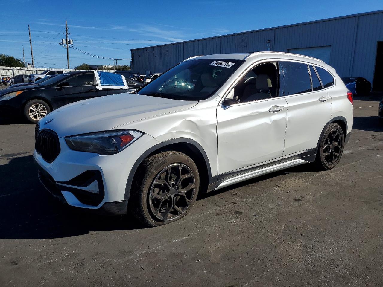 2020 BMW X1 VIN WBXJG7C09L5P61995 photo 1