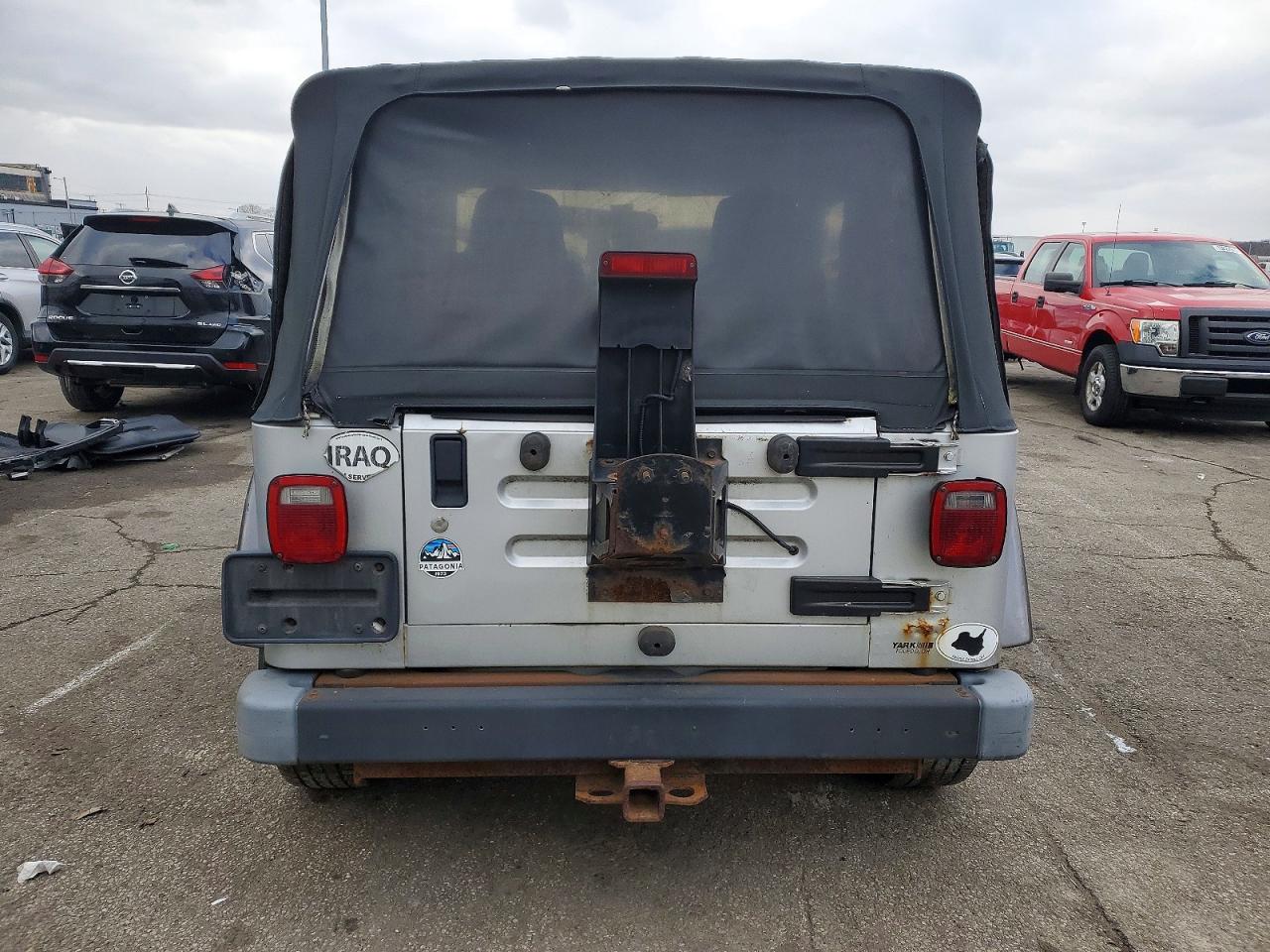 2004 Jeep Wrangler / VIN 1J4FA39S54P792280 photo 6