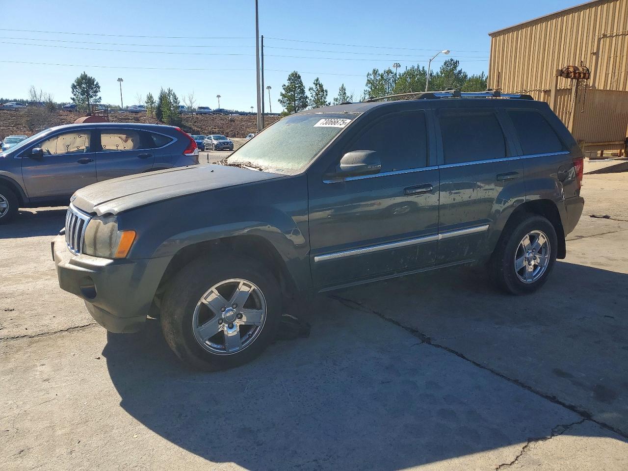 2007 Jeep Grand cher VIN 1J8HS68267C591412 photo 1