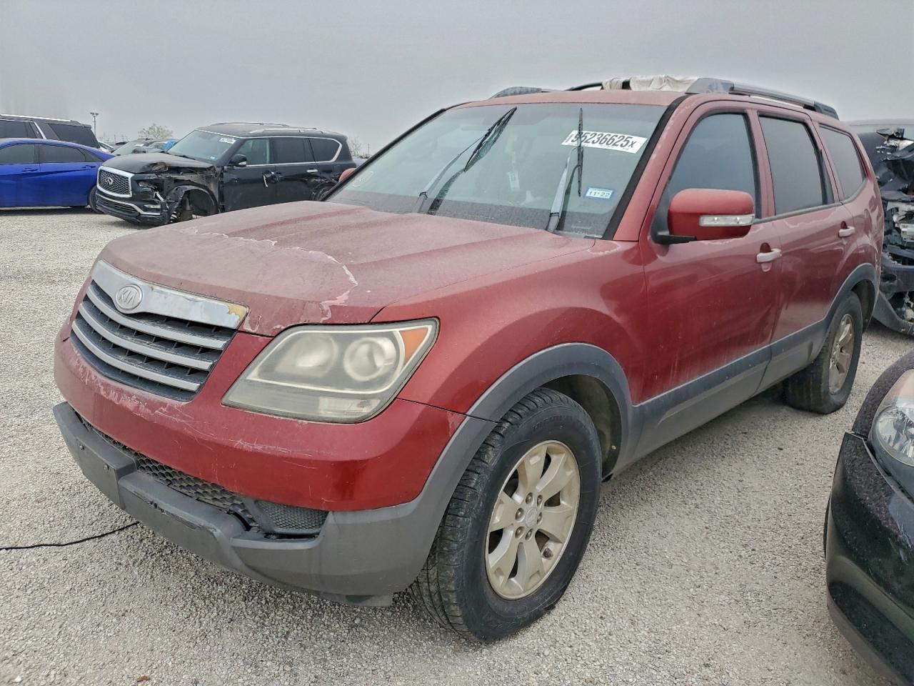 2009 Kia Borrego VIN KNDJJ741X95014386 photo 1