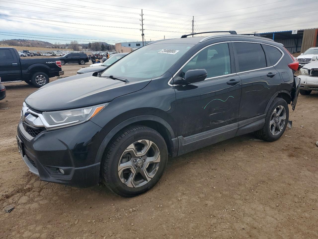 2019 Honda Crv VIN 2HKRW2H59KH646581 photo 1