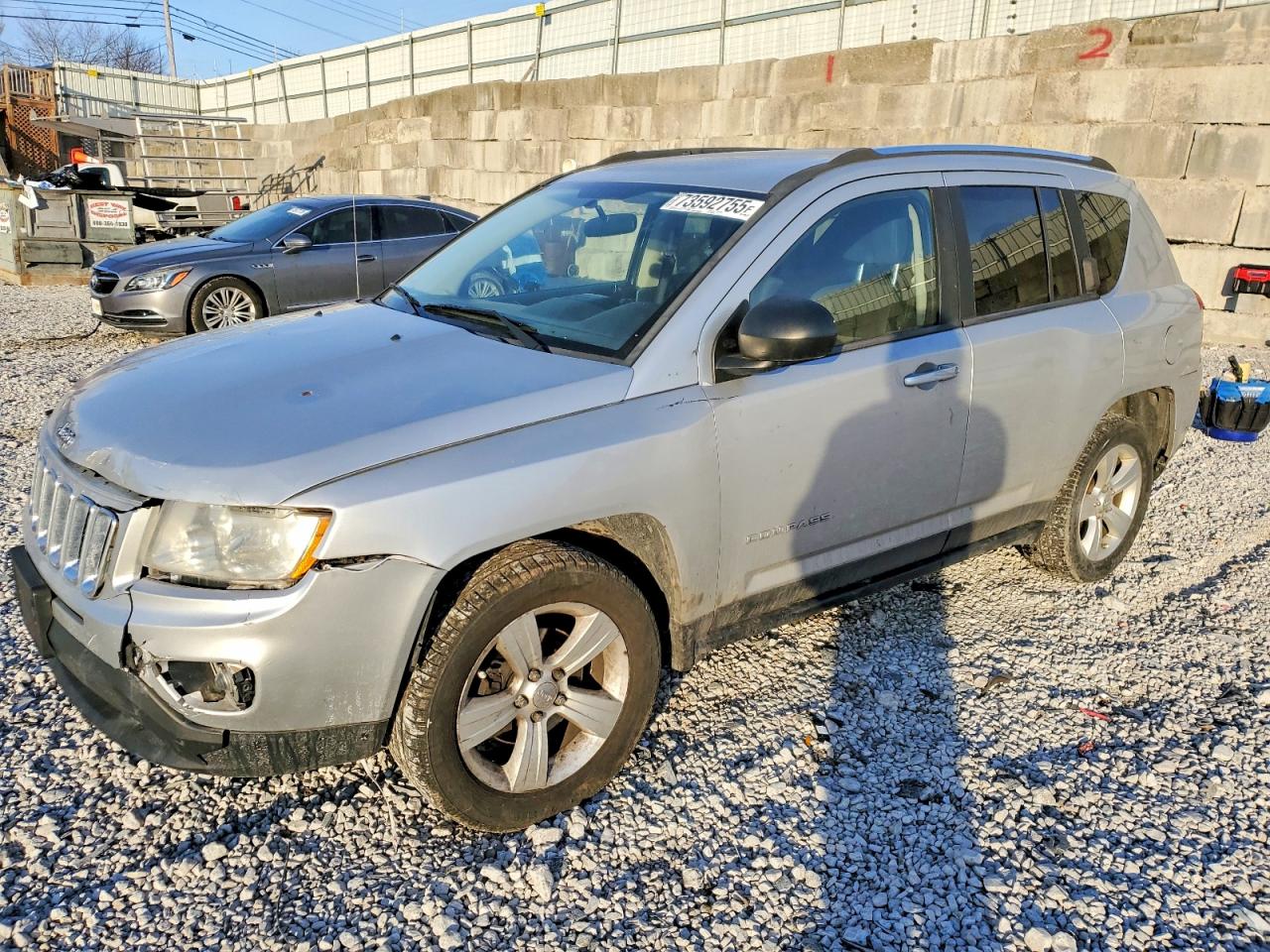 2012 Jeep Compass VIN 1C4NJDBB7CD562399 photo 1