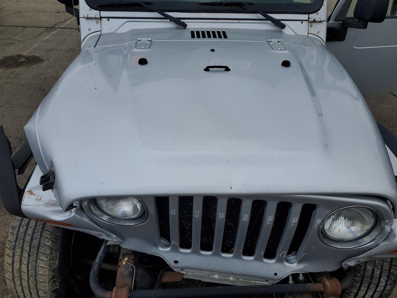 2004 Jeep Wrangler / VIN 1J4FA39S54P792280 photo 11