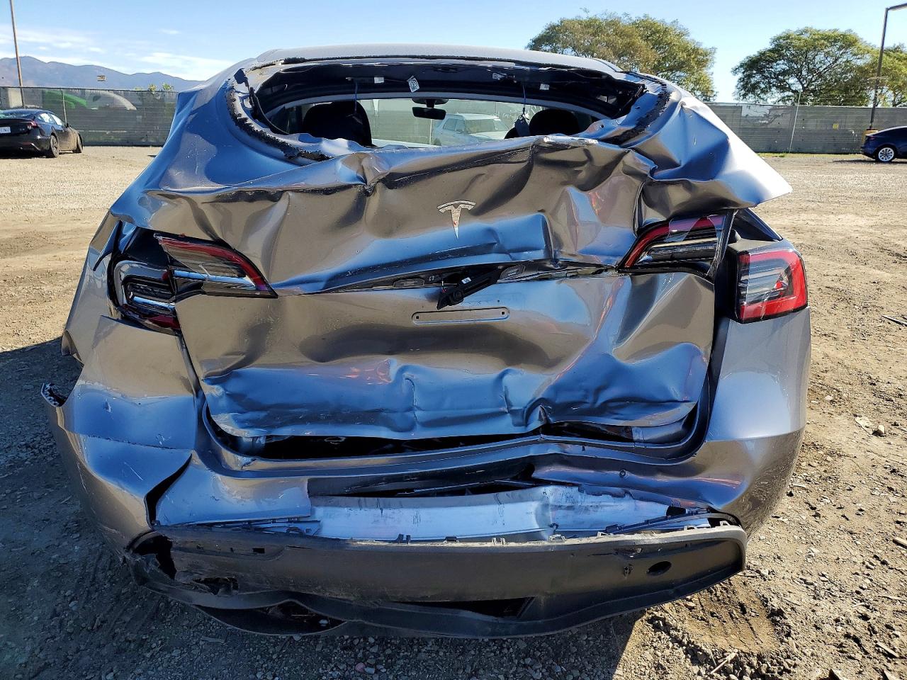 2025 Tesla Model y VIN 7SAYGDED8SF314150 photo 6