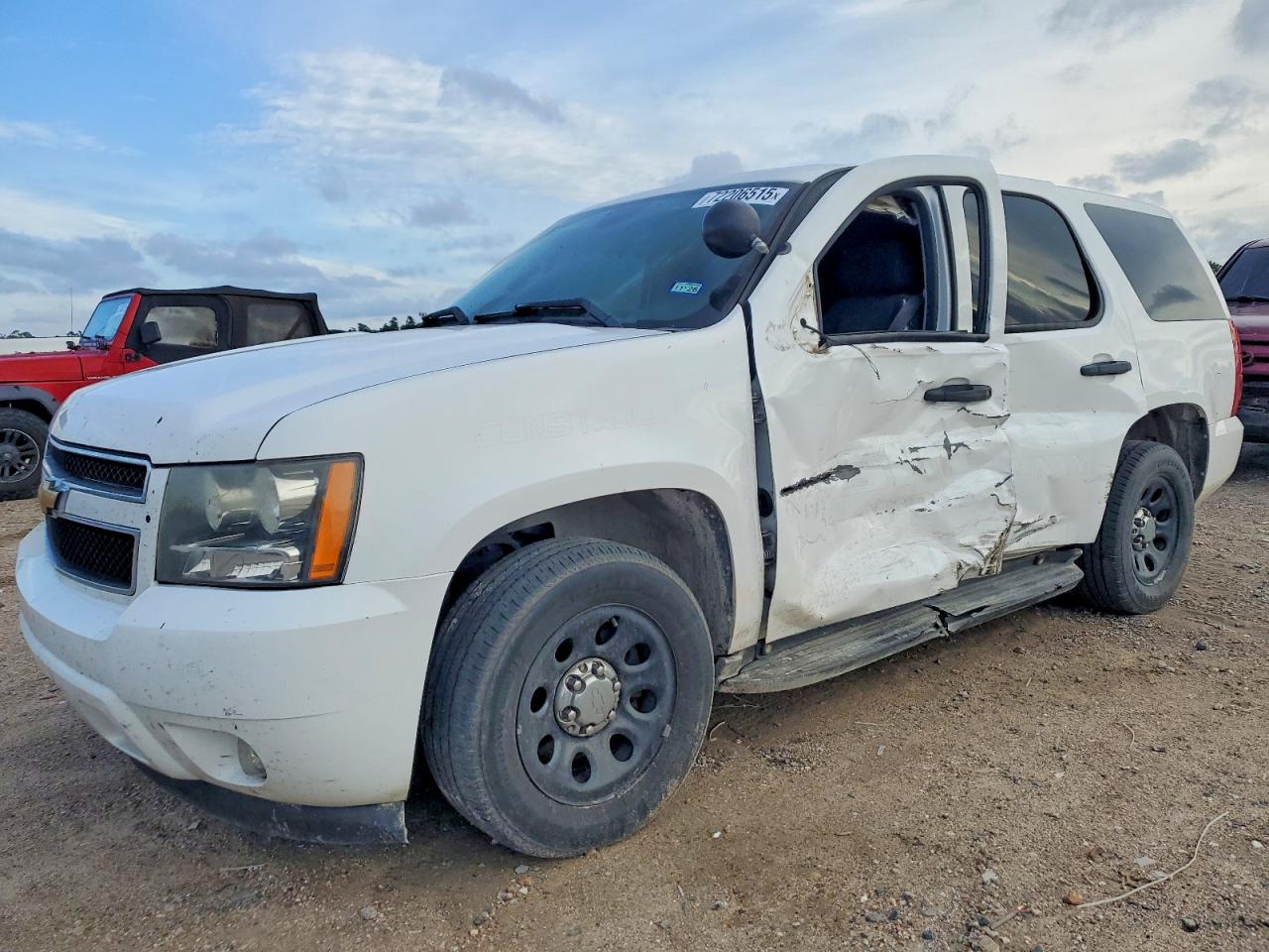 2012 Chevrolet Tahoe VIN 1GNLC2E04CR317327 photo 1
