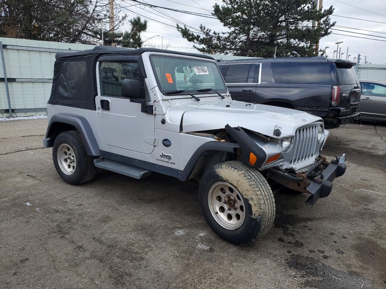 2004 Jeep Wrangler / VIN 1J4FA39S54P792280 photo 4