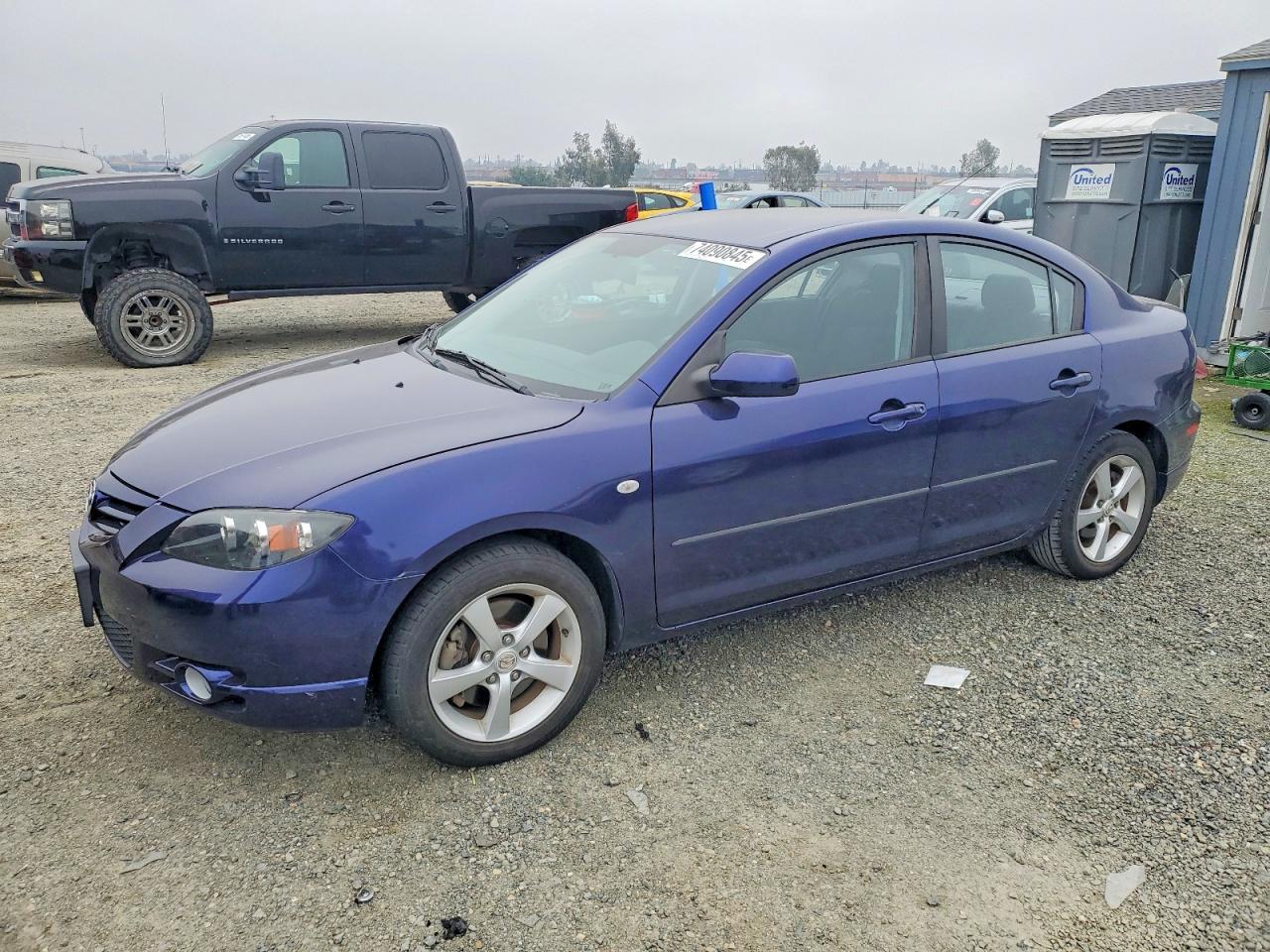 2005 Mazda Mazda3 VIN JM1BK323X51293225 photo 1