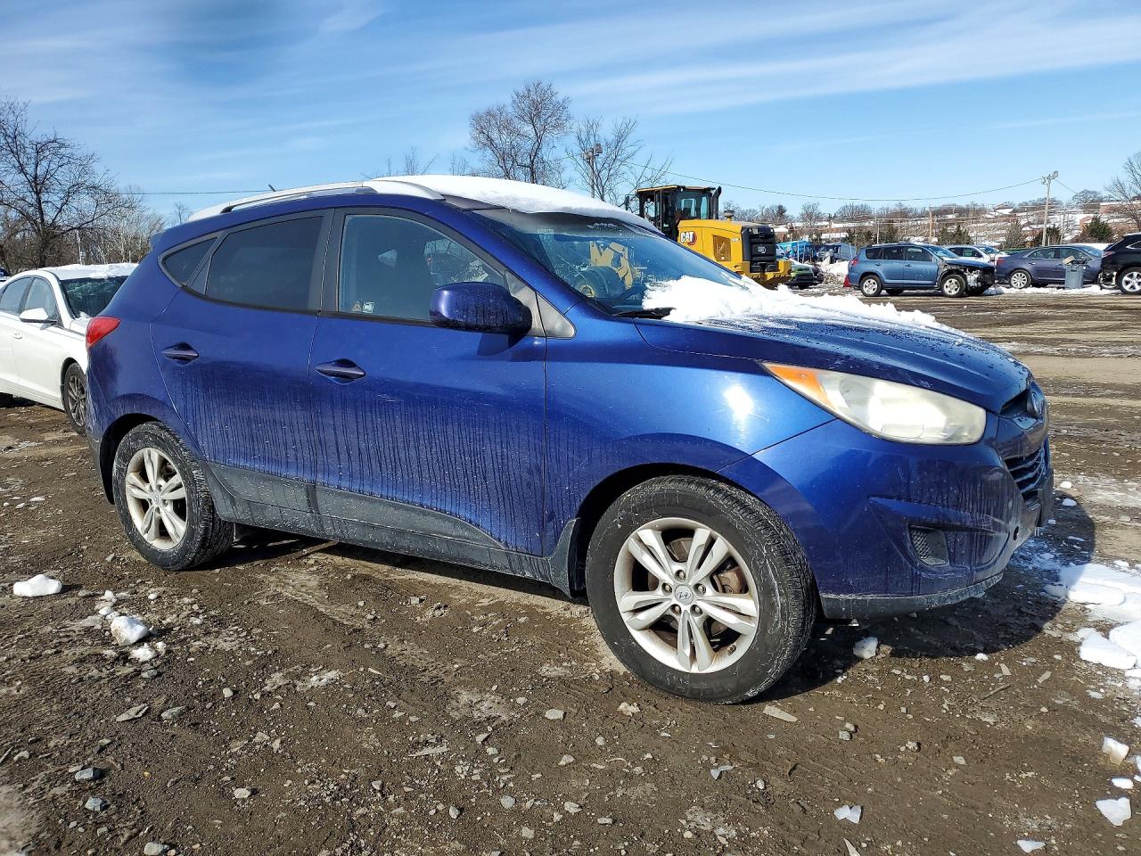 2011 Hyundai Tucson VIN KM8JUCAC5BU132164 photo 4