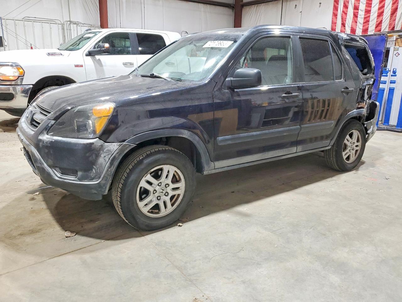 2002 Honda Crv VIN JHLRD78862C077989 photo 1