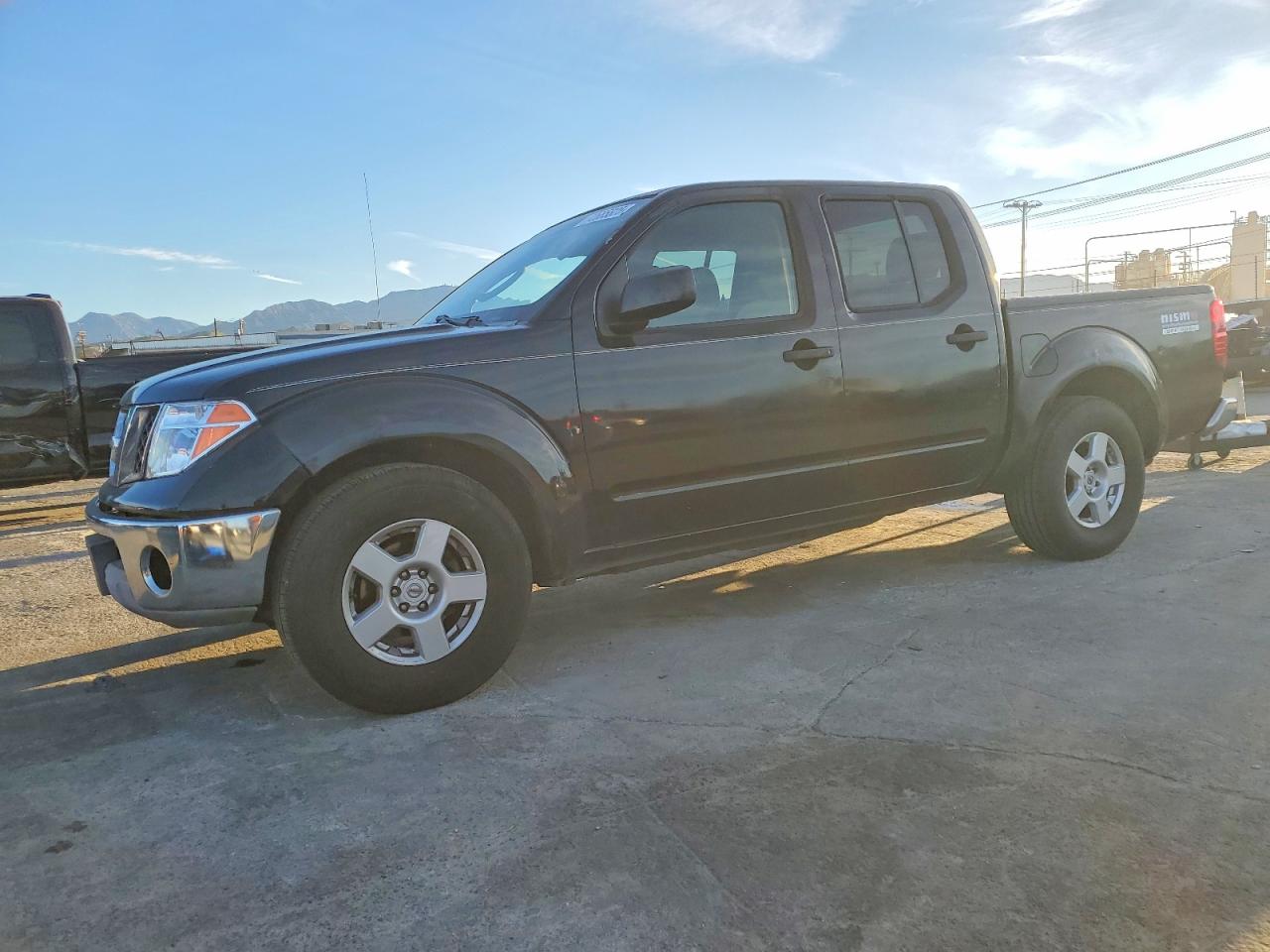 2007 NISS Frontier VIN 1N6AD07U27C402710 photo 1