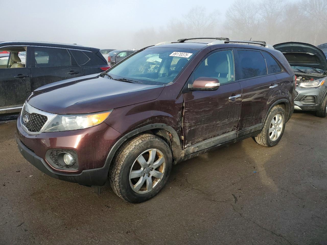 2012 Kia Sorento VIN 5XYKTDA61CG299104 photo 1