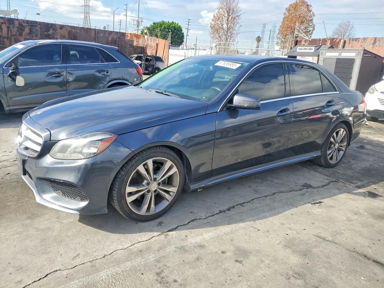 2015 Mercedes-Benz E-class VIN WDDHF5KB0FB091352 photo 1