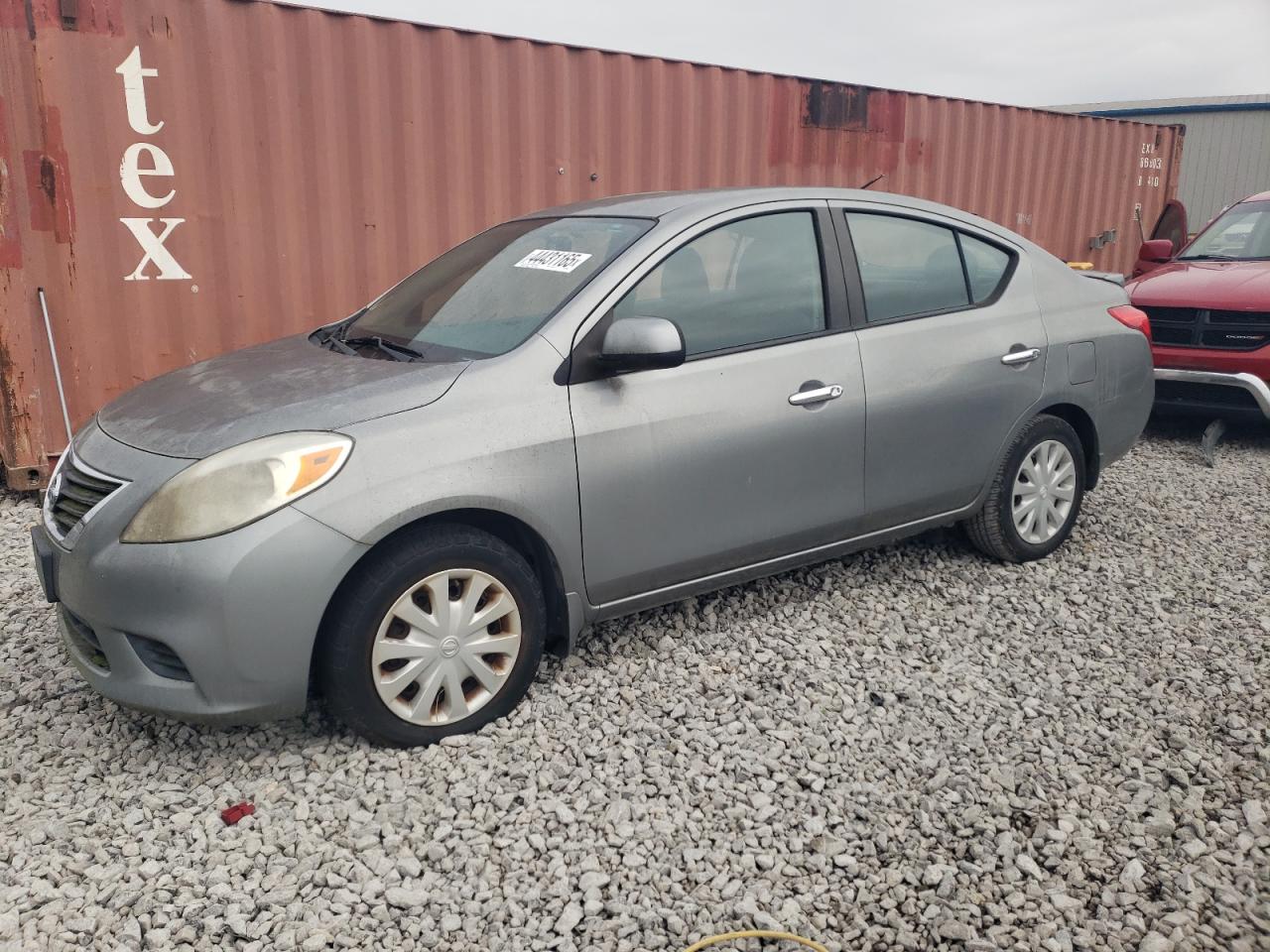2013 Nissan Versa VIN 3N1CN7AP9DL858999 photo 1