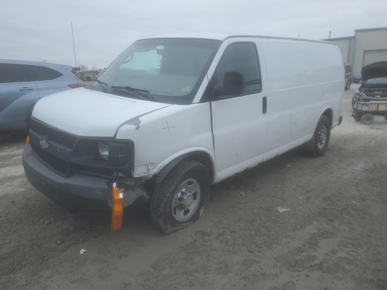 2012 Chevrolet Express VIN 1GCWGFCA1C1202521 photo 1