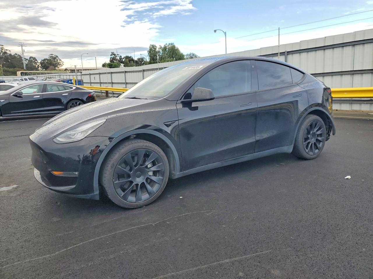 2022 Tesla Model y VIN 7SAYGDEE5NF506414 photo 1