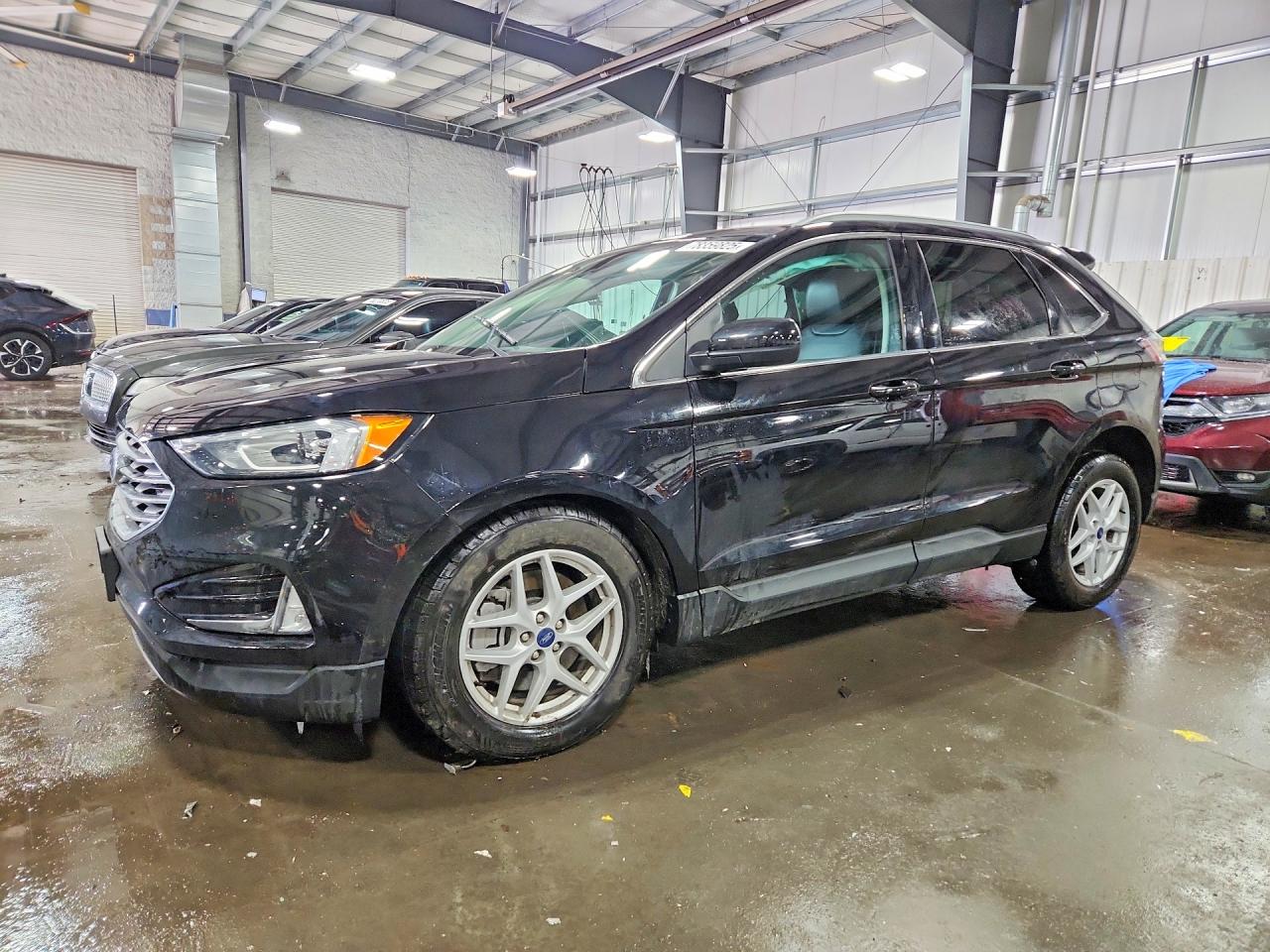 2021 Ford Edge VIN 2FMPK4J9XMBA09608 photo 1