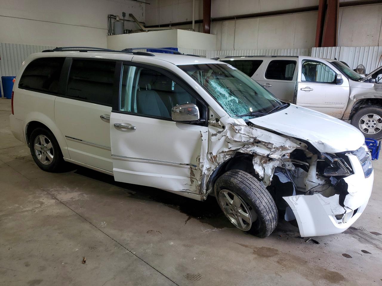 2009 Dodge Caravan VIN 2D8HN54159R590141 photo 4