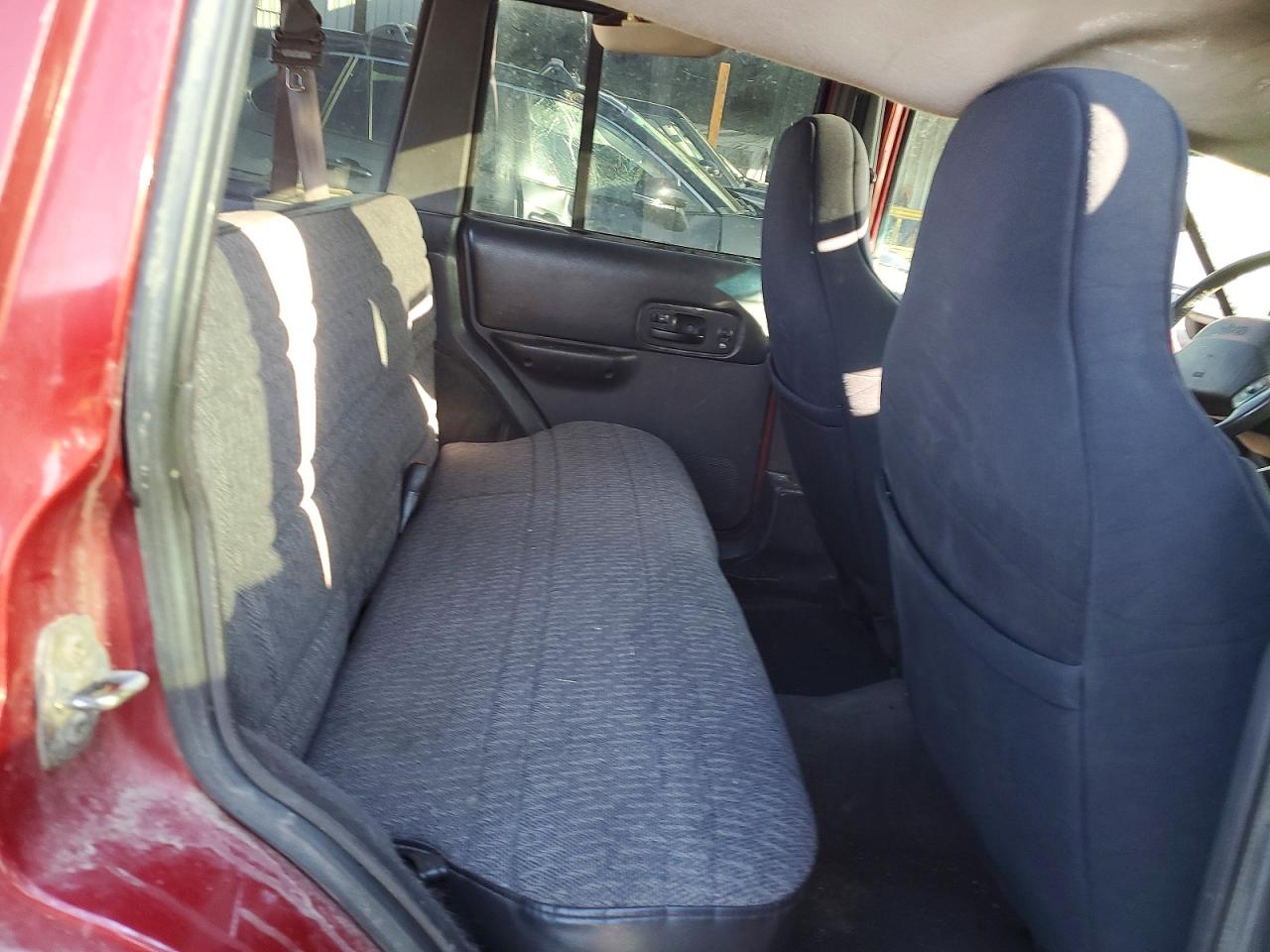 1999 Jeep Grand cher VIN 1J4FF68SXXL653133 photo 10