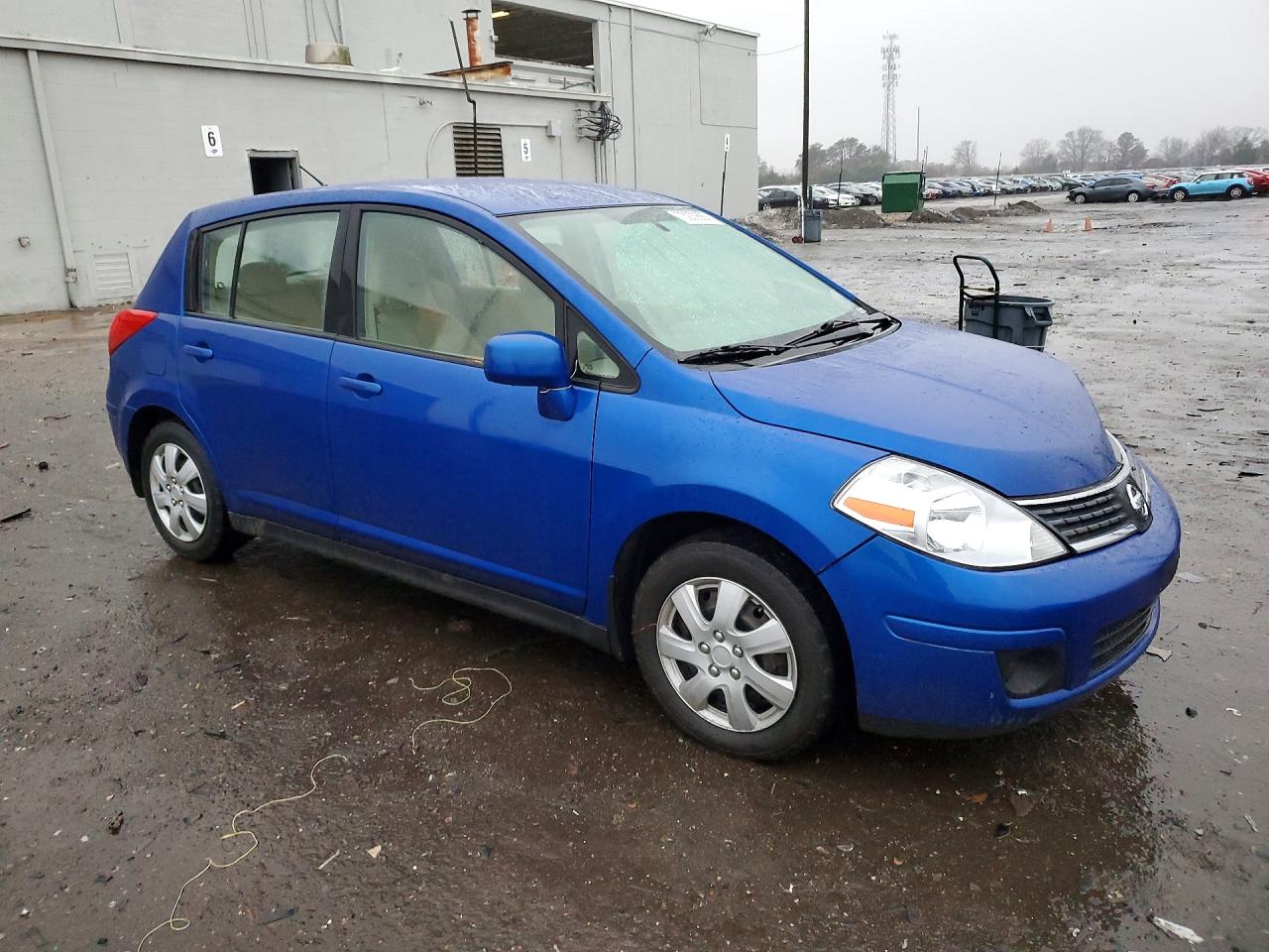 2009 NISS Versa VIN 3N1BC13EX9L394929 photo 4