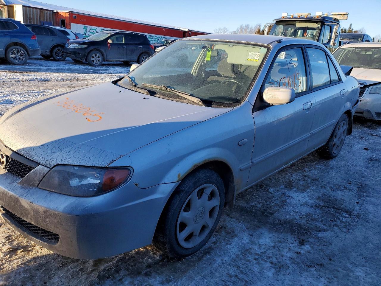 2003 MAZDA Protege VIN JM1BJ225730205765 photo 1