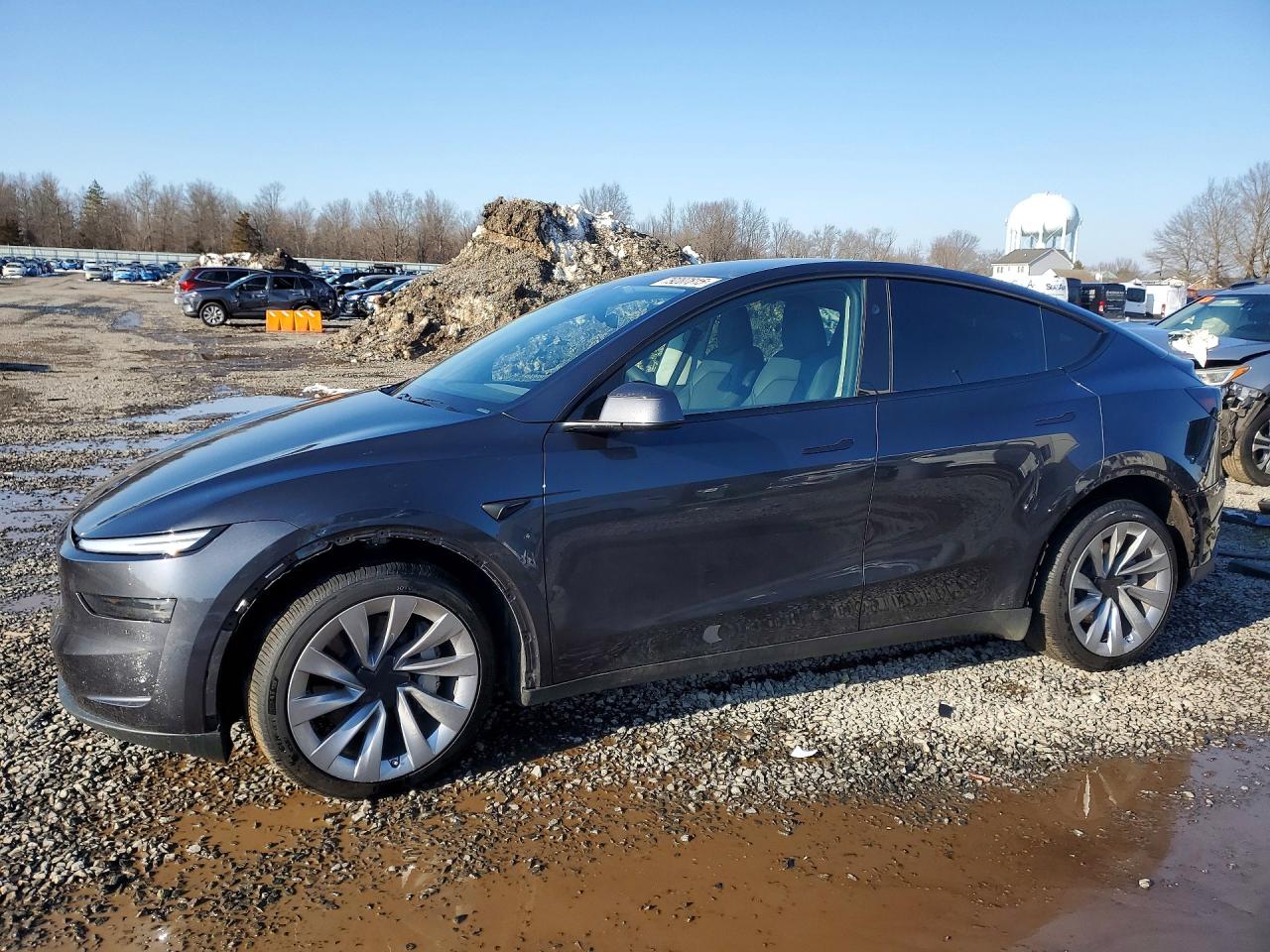 2026 Tesla Model y VIN 7SAYGDEE9TA410232 photo 1